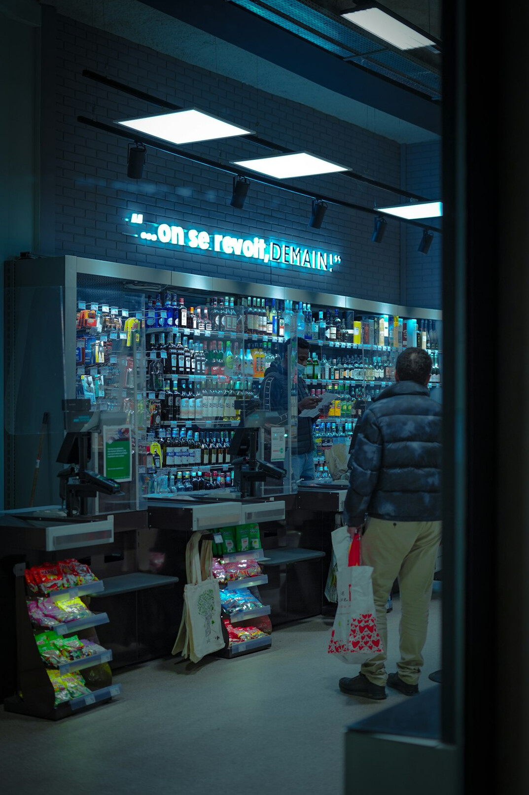store detective watching shoppers