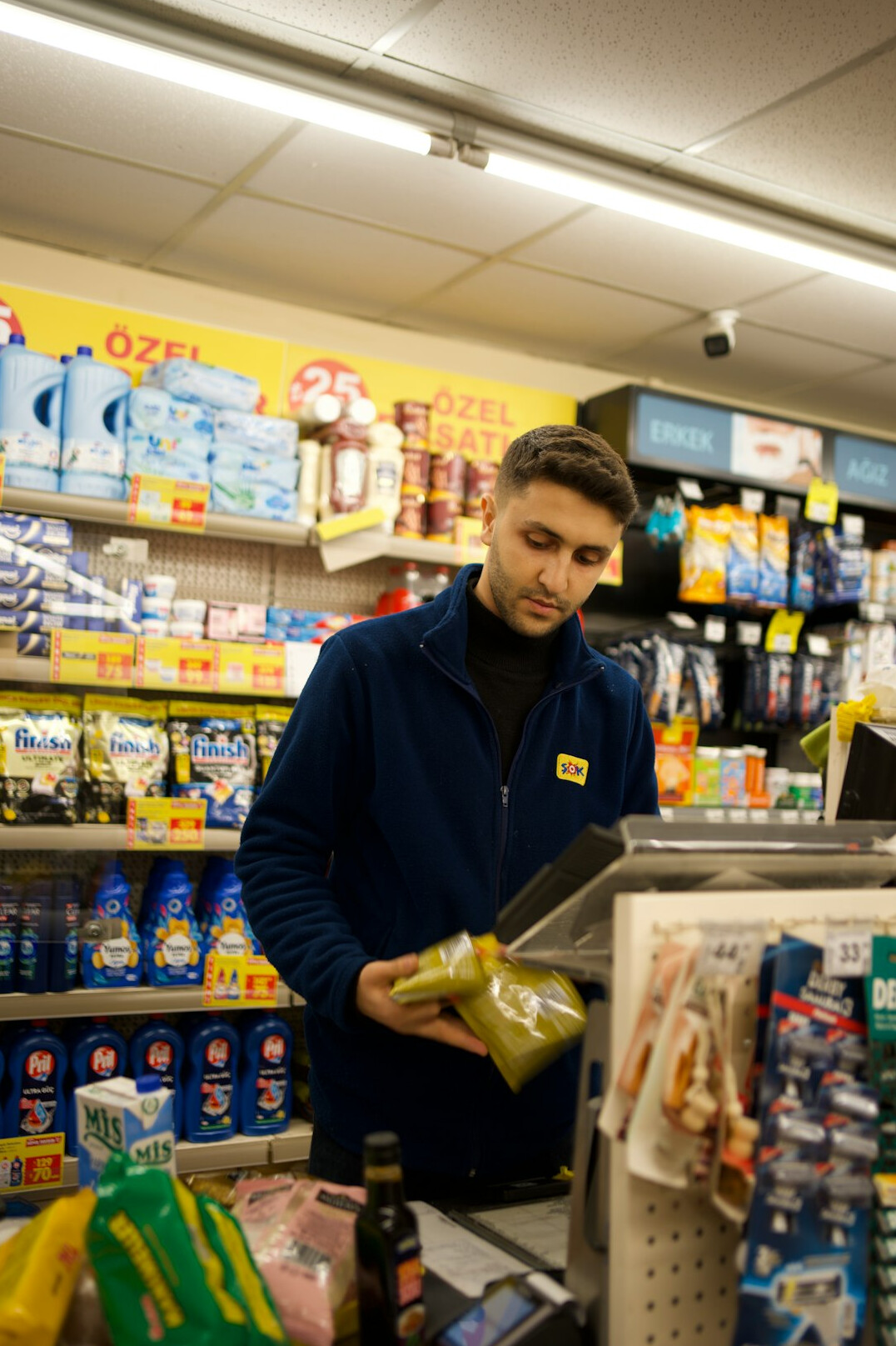 man stealing food in supermarket