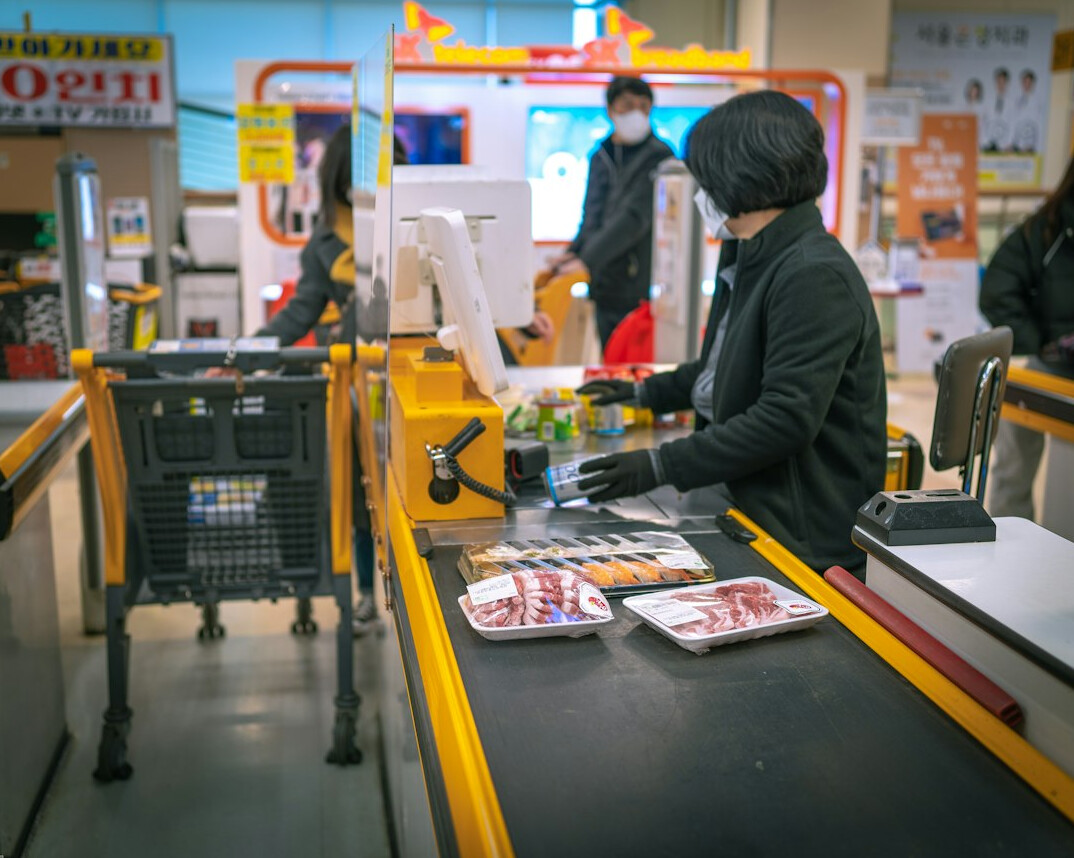 security guard catching thief in supermarket