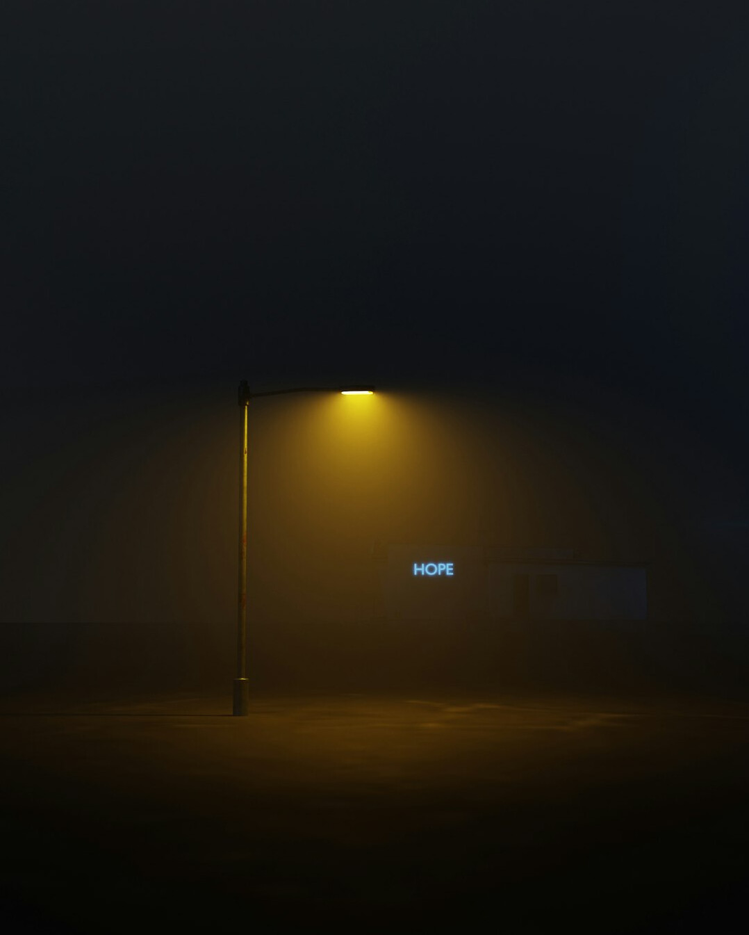 Foggy empty street illuminated by a single vintage lamppost at night
