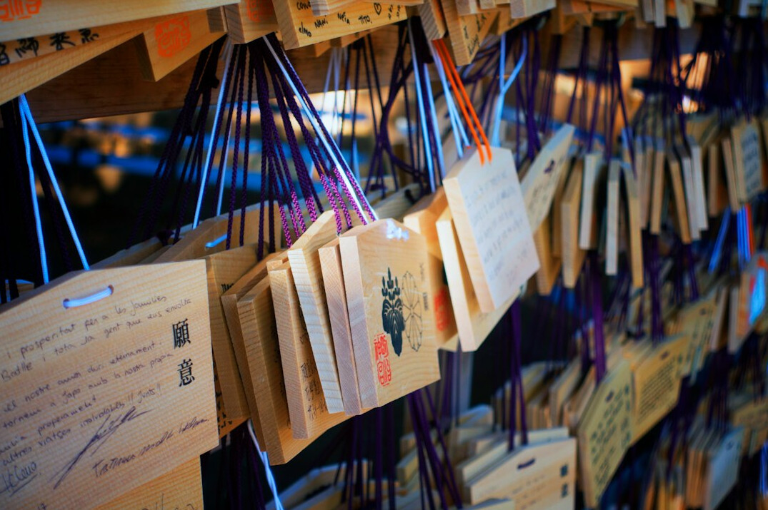 Stacks of old court archive folders and documents tied with string in a dim records room
