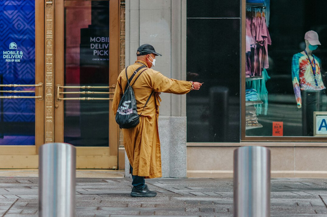 store security guard monitoring shoppers